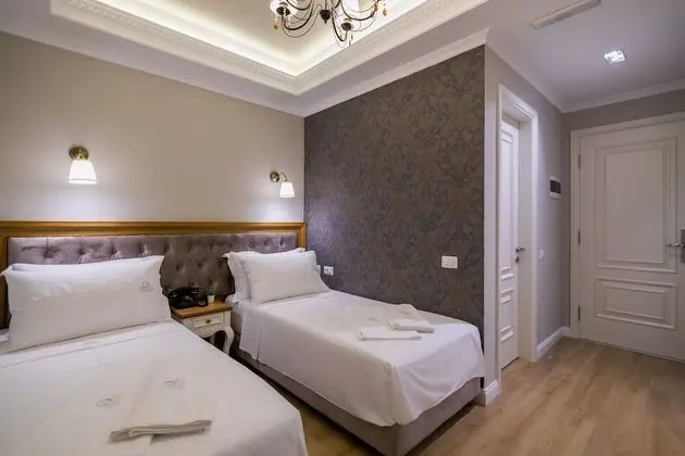 Deluxe Tek Büyük veya İki Ayrı Yataklı Oda