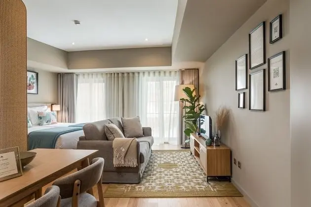 Tek Büyük veya İki Ayrı Yataklı Oda, Bahçe Manzaralı