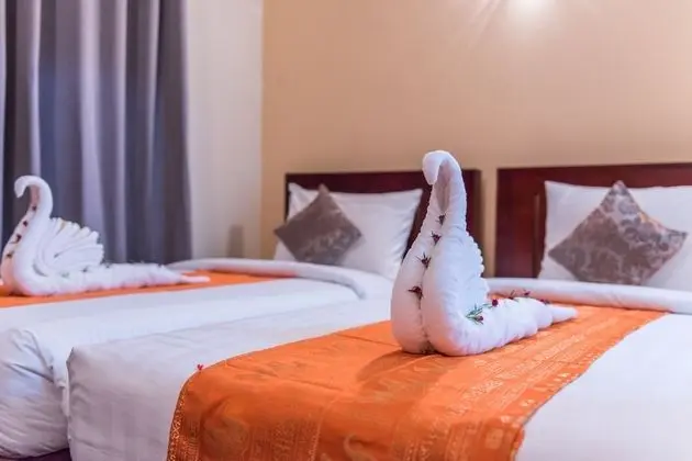 Deluxe Tek Büyük veya İki Ayrı Yataklı Oda