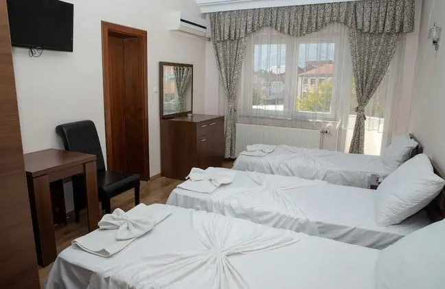 Economy Üç Kişilik Oda