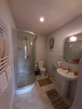 Deluxe Tek Büyük Yataklı Oda (for 2 adults + 1 child)