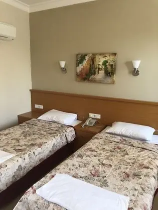 Basic Tek Büyük veya İki Ayrı Yataklı Oda