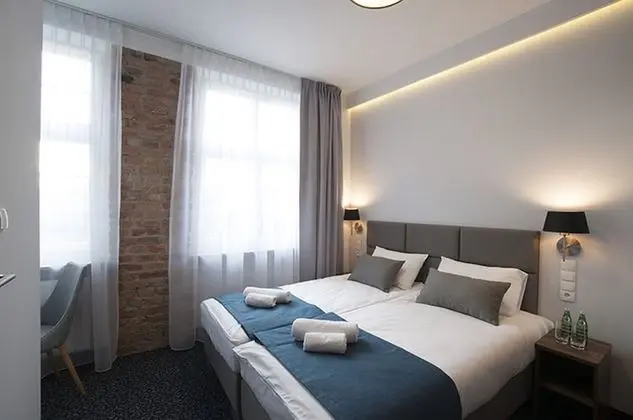 Economy Tek Büyük veya İki Ayrı Yataklı Oda