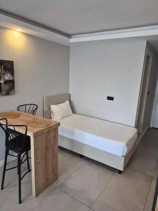 https://images.odamax.com/img/1024x768/odamax/image/upload/Likya_202_Pansiyon_202605182243440_triple_oda2_2_.jpg