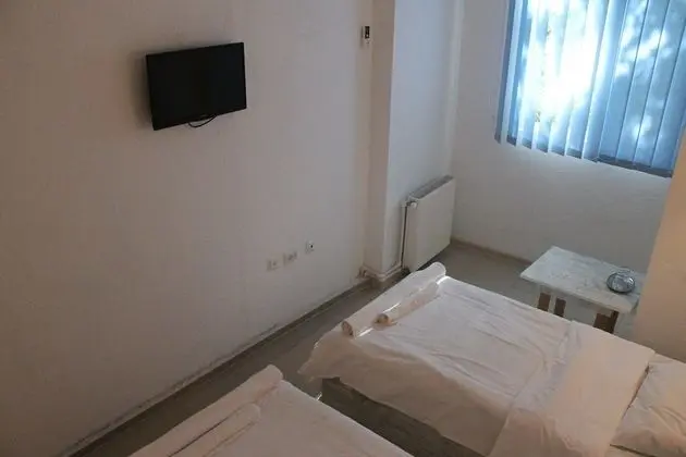 Üç Kişilik Oda