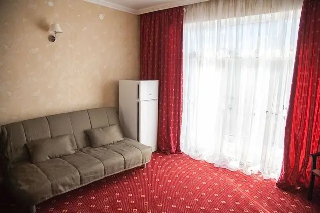 Comfort Tek Büyük veya İki Ayrı Yataklı Oda (+ sofa)