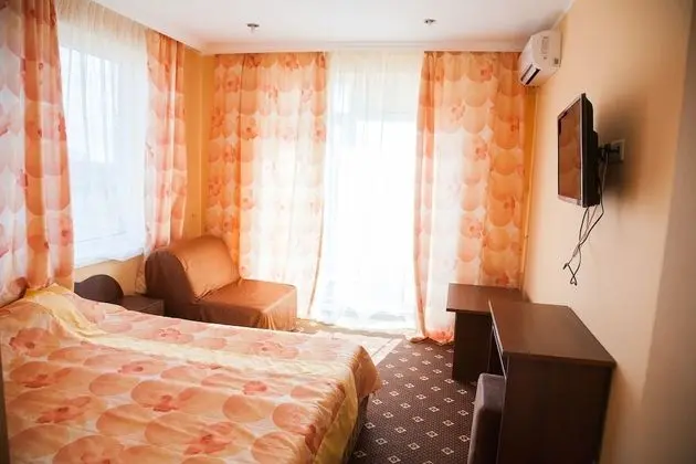 Comfort Tek Büyük veya İki Ayrı Yataklı Oda (+ sofa)