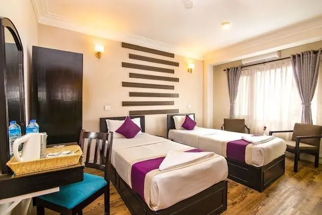 Deluxe Tek Büyük veya İki Ayrı Yataklı Oda
