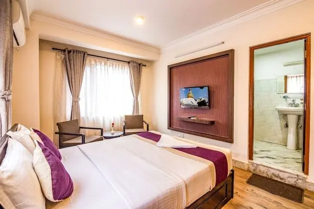 Deluxe Tek Büyük veya İki Ayrı Yataklı Oda