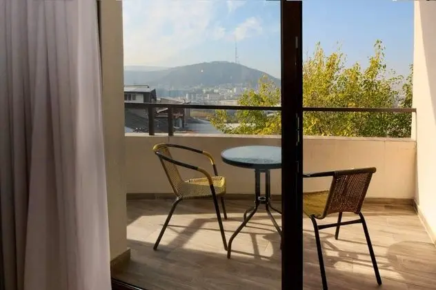 Üç Kişilik Oda, Şehir Manzaralı
