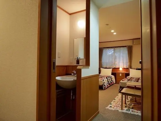 Economy Tek Büyük veya İki Ayrı Yataklı Oda, 2 Tek Kişilik Yatak, Ortak Banyo, Köşe