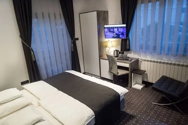 Deluxe Tek Büyük veya İki Ayrı Yataklı Oda, Engellilere Uygun