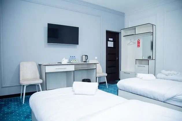 Deluxe Üç Kişilik Oda