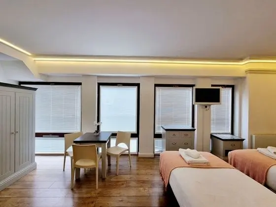 Üç Kişilik Oda