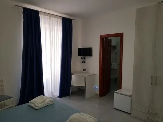 Basic Tek Büyük veya İki Ayrı Yataklı Oda