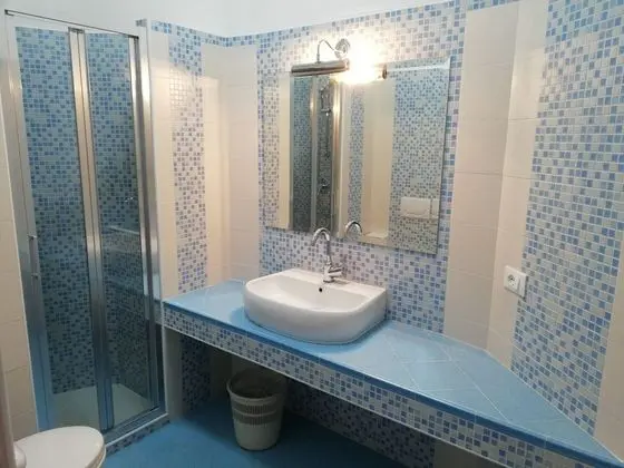 Basic Tek Büyük veya İki Ayrı Yataklı Oda