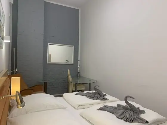 Tek Büyük veya İki Ayrı Yataklı Oda (2 - incl. Cleaning Fee 10 EUR)