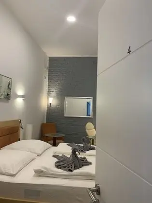 Tek Büyük veya İki Ayrı Yataklı Oda (2 - incl. Cleaning Fee 10 EUR)
