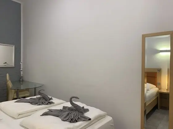 Tek Büyük veya İki Ayrı Yataklı Oda (2 - incl. Cleaning Fee 10 EUR)