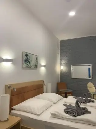 Tek Büyük veya İki Ayrı Yataklı Oda (2 - incl. Cleaning Fee 10 EUR)