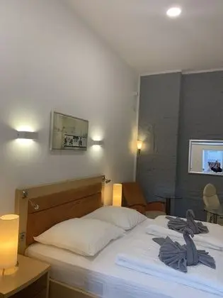 Tek Büyük veya İki Ayrı Yataklı Oda (2 - incl. Cleaning Fee 10 EUR)