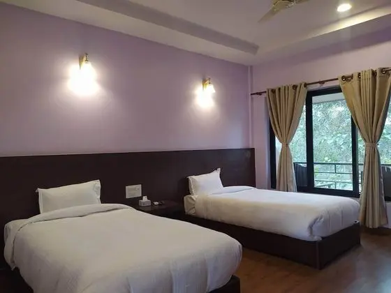 Deluxe Tek Büyük veya İki Ayrı Yataklı Oda (Morden)