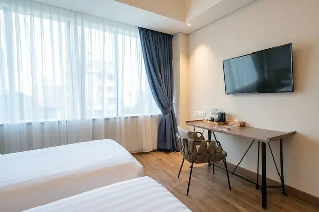 Deluxe Tek Büyük veya İki Ayrı Yataklı Oda