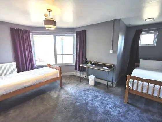 Deluxe Dört Kişilik Oda, Birden Çok Yatak, Sigara İçilmez (Wing King Room 13-Ground Floor)