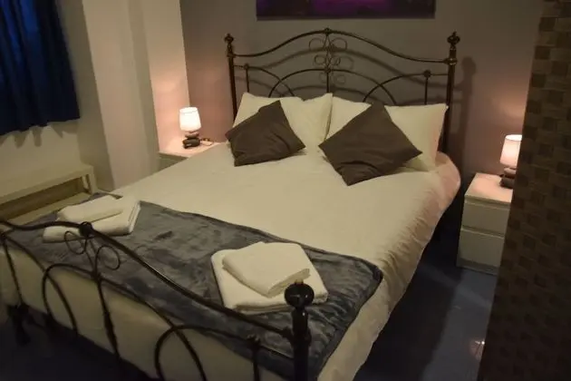 Deluxe Dört Kişilik Oda, Banyolu/Duşlu