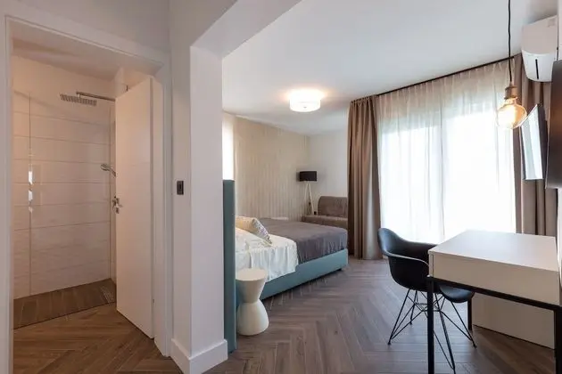 Deluxe Tek Büyük veya İki Ayrı Yataklı Oda, Balkon