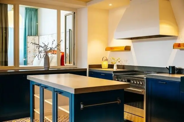 Historic 3-Bedroom Apartment with private Patio