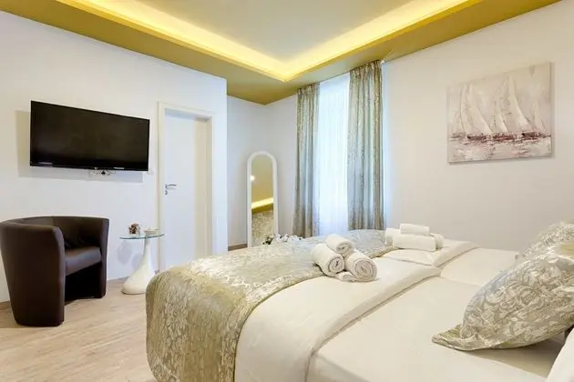 Deluxe Tek Büyük veya İki Ayrı Yataklı Oda