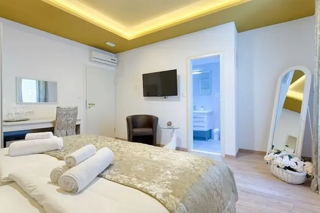 Deluxe Tek Büyük veya İki Ayrı Yataklı Oda