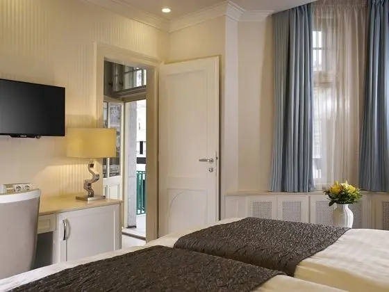 Deluxe Tek Büyük veya İki Ayrı Yataklı Oda, Balkon