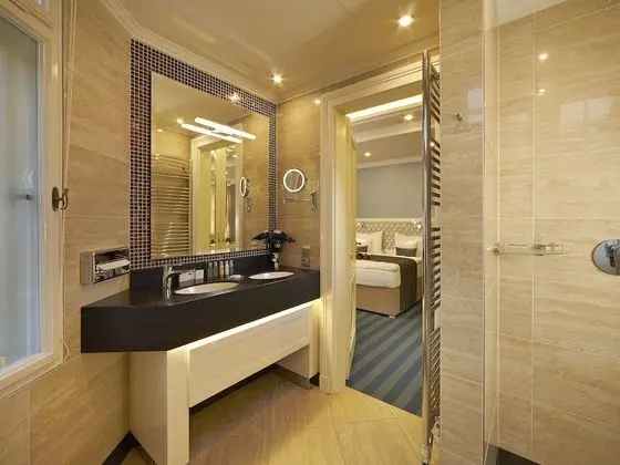 Deluxe Tek Büyük veya İki Ayrı Yataklı Oda, Balkon
