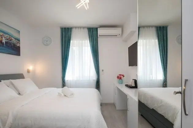 Deluxe Tek Büyük veya İki Ayrı Yataklı Oda