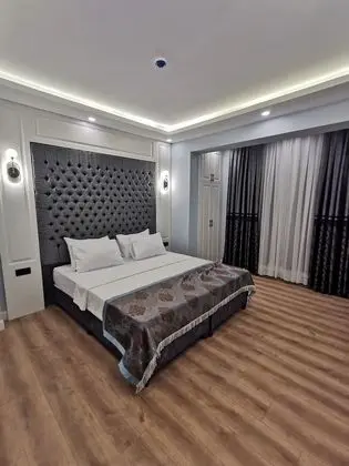Deluxe Tek Büyük veya İki Ayrı Yataklı Oda