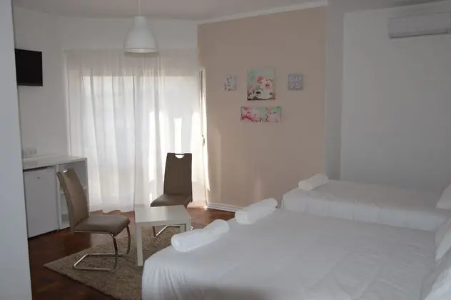 Üç Kişilik Oda