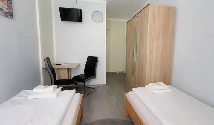 Basic İki Ayrı Yataklı Oda, Ortak Banyo