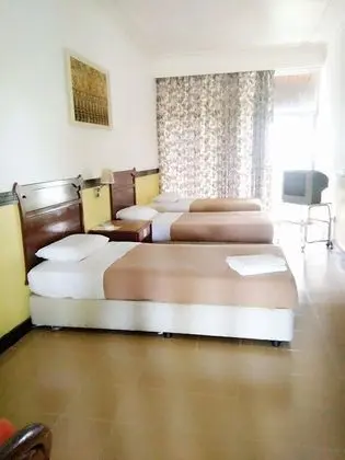 Üç Kişilik Oda