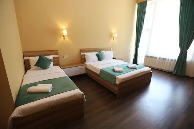 Deluxe Üç Kişilik Oda