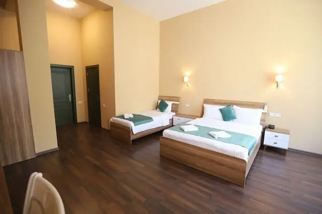 Deluxe Üç Kişilik Oda