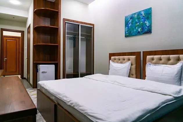 Deluxe Tek Büyük veya İki Ayrı Yataklı Oda