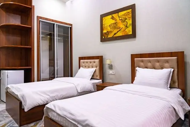 Deluxe Tek Büyük veya İki Ayrı Yataklı Oda
