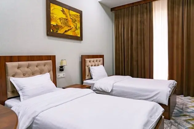 Deluxe Tek Büyük veya İki Ayrı Yataklı Oda