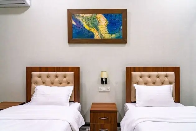 Deluxe Tek Büyük veya İki Ayrı Yataklı Oda