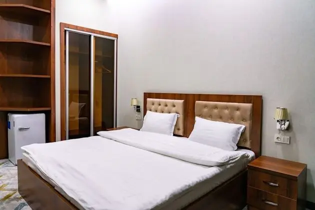 Deluxe Tek Büyük veya İki Ayrı Yataklı Oda