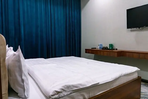 Deluxe Tek Büyük veya İki Ayrı Yataklı Oda