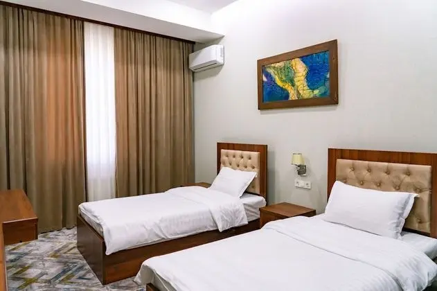 Deluxe Tek Büyük veya İki Ayrı Yataklı Oda