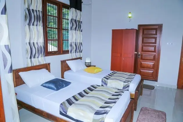 Deluxe Tek Büyük veya İki Ayrı Yataklı Oda